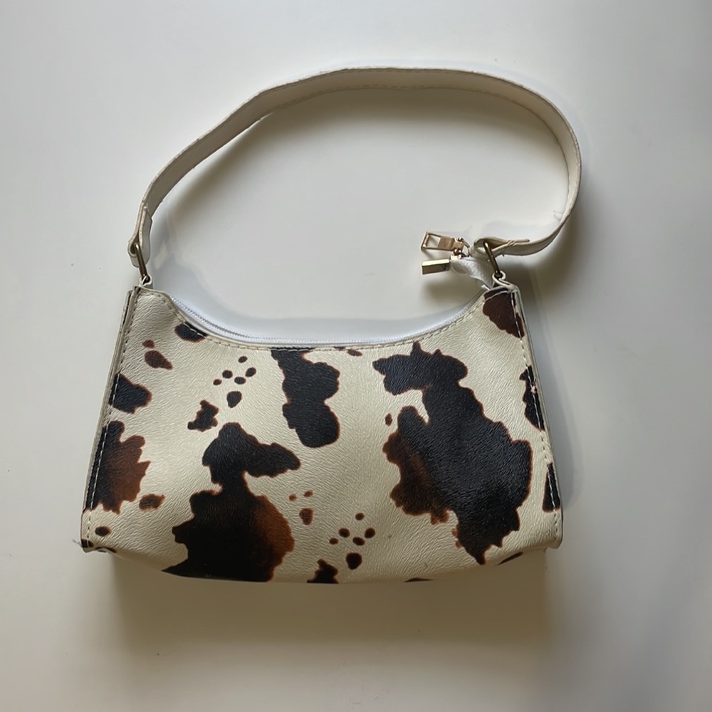 Brown cow print leather purse